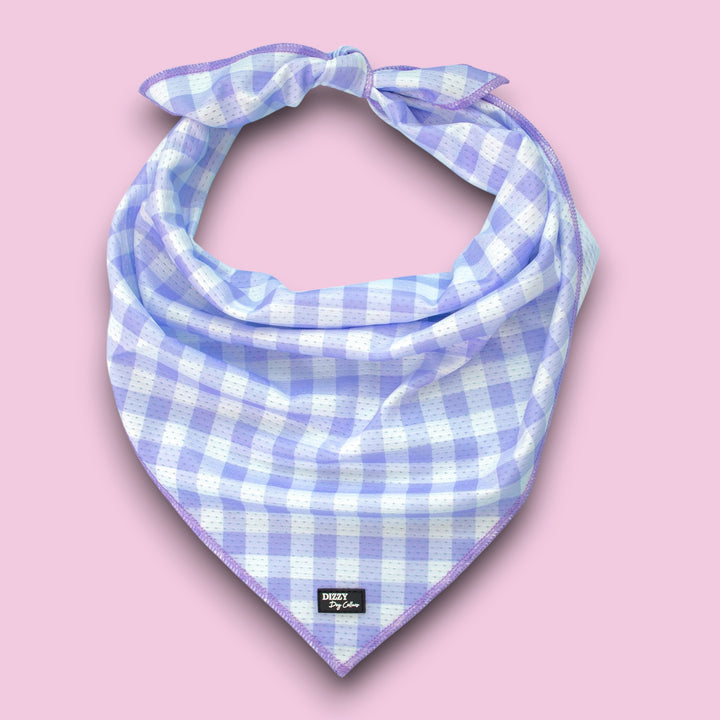 lilac and white checkered bandana on a pink background